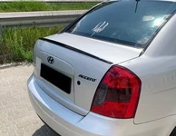 Спойлер LIP (Sunplex, чорний) (115,8см * 6,3см) для Hyundai Accent 2006-2010 рр