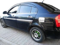 Зовнішня окантовка вікон (4 шт, нерж) Carmos - Турецька сталь для Hyundai Accent 2006-2010 рр