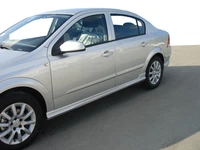 Бічні спідниці Sedan (під фарбування) для Opel Astra H 2004-2013 рр