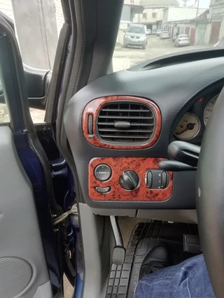 Накладки на панель (Meric) Дерево для Chrysler Voyager 2001-2007 рр