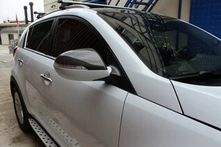 Накладки на дзеркала (2 шт., карбон) для Kia Sportage 2010-2015 рр