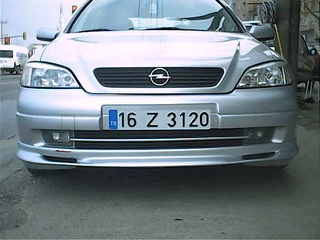 Передня нижня накладка Sedan (під фарбування) для Opel Astra G classic 1998-2012 рр