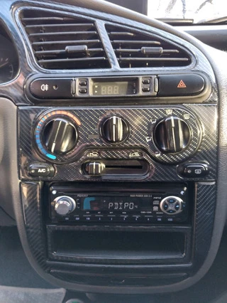 Накладки на панель Карбон для Daewoo Lanos