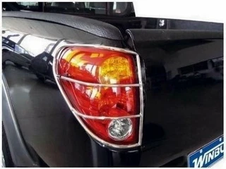 Захист задніх фонарів (нержавійка, 2 шт) для Mitsubishi L200 2006-2015 рр