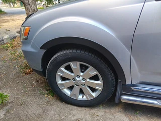 Накладки на арки (4 шт, чорні) для Mitsubishi Outlander 2006-2012рр