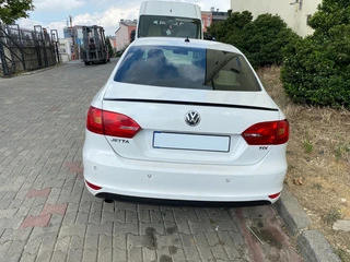 Спойлер LIP (Sunplex, чорний) (115,8см * 6,3см) для Volkswagen Jetta 2011-2018 рр