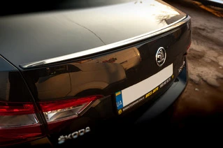 Спойлер LIP (Sunplex, чорний) (119,2см* 7,3см) для Skoda Superb 2015-2024 рр