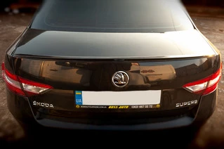 Спойлер LIP (Sunplex, чорний) (119,2см* 7,3см) для Skoda Superb 2015-2024 рр